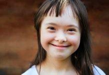 Many sick and disabled people are refused permanent visas. We need compassion, not discrimination child with Down syndrome