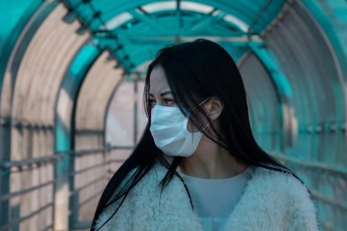 woman wearing mask