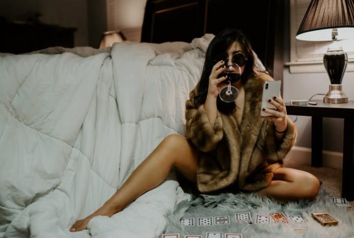 Woman drinking wine | Image: Brittani Burns:Unsplash