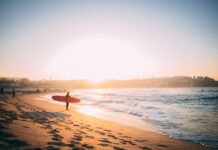 The new Australian citizenship test: can you really test ‘values’ via multiple choice? Australian surfer | Photo by Alex King on Unsplash