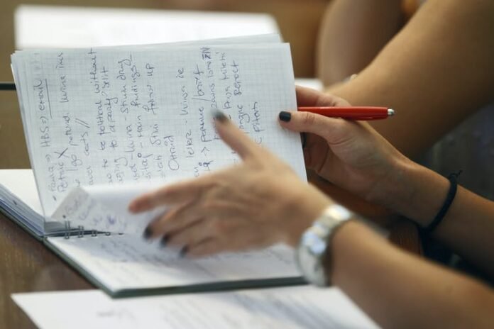 If you’re just copying down what the lecturer says and you don’t revise what you’ve written down, there’s little point in taking notes. Photo: Shutterstock